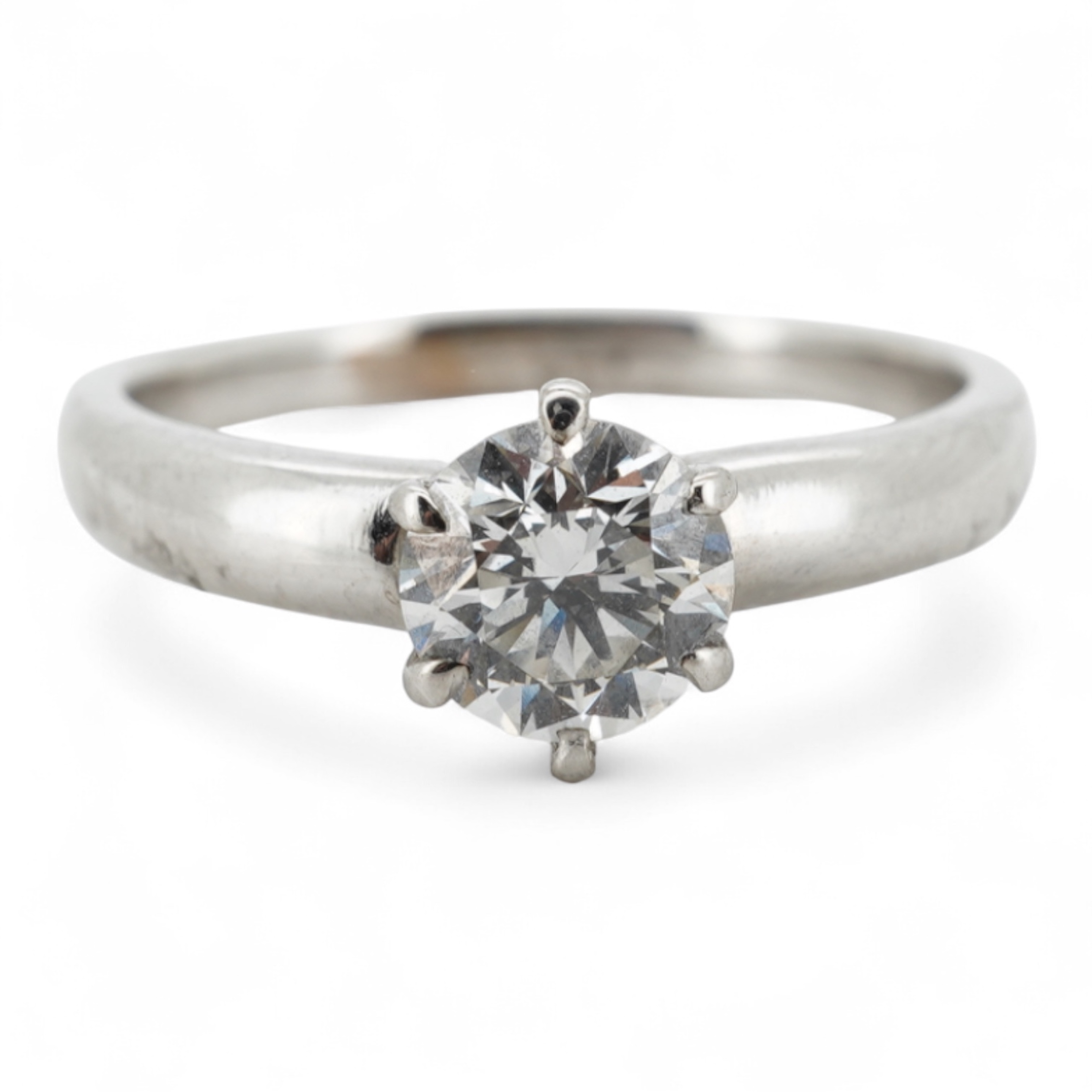 A diamond ring, claw-set with a brilliant-cut diamond weighing approximately 0.80 carats, mounted in white gold, size M, stamped 14K, gross weight approximately 3 grams